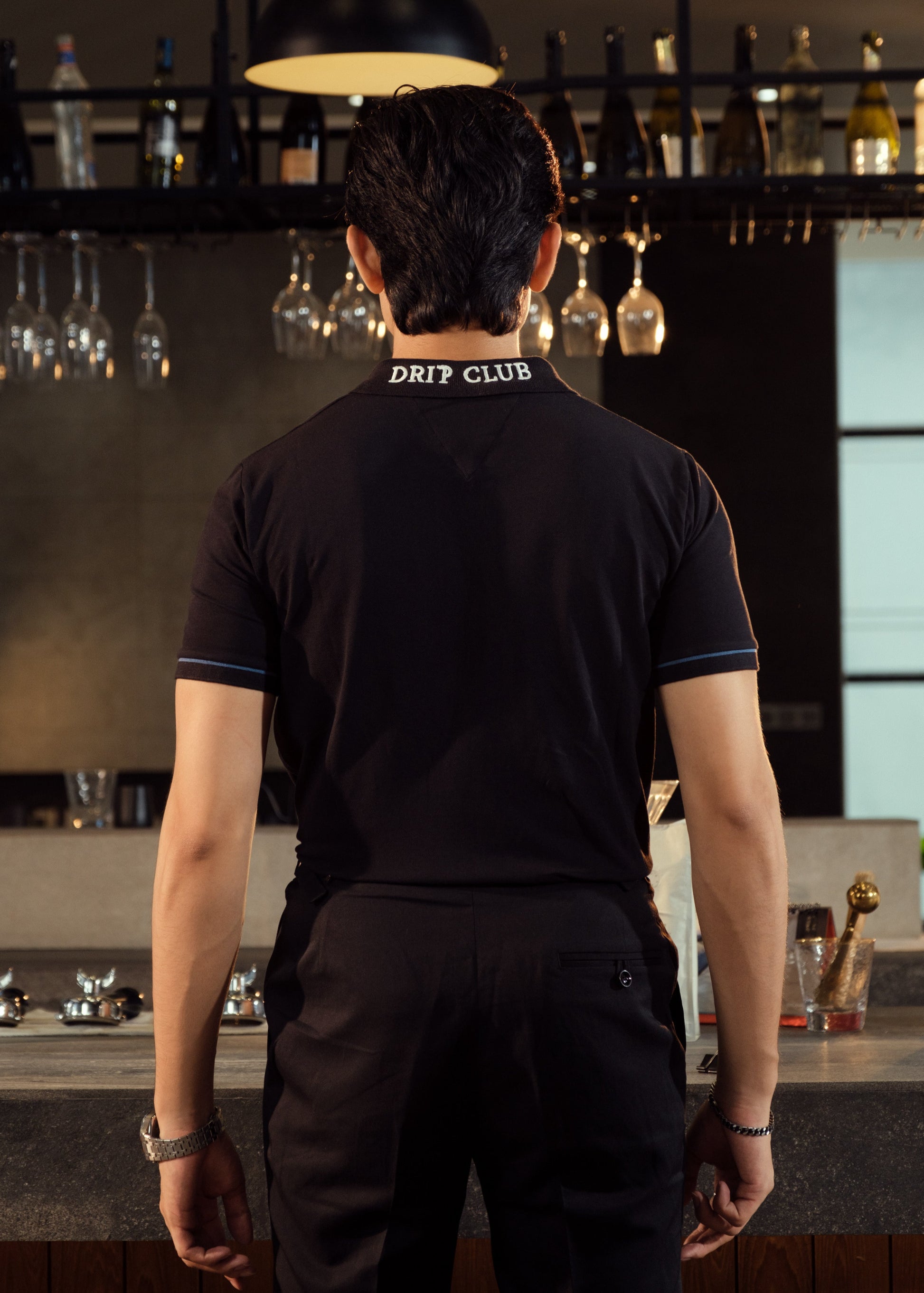 Drip Club Eclipse unisex deep black minimalist polo shirt, standard unisex sizing