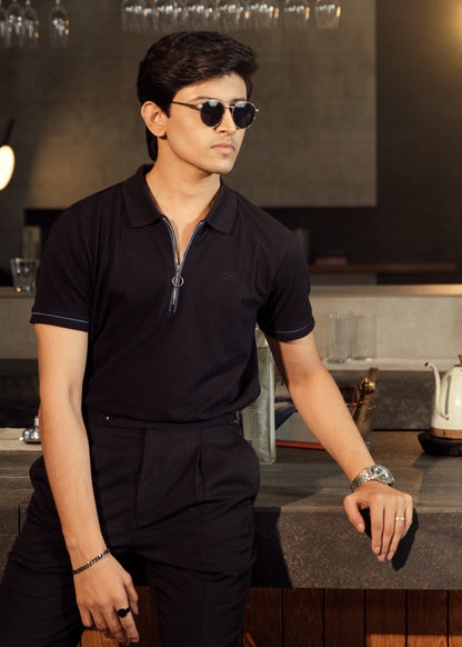 Drip Club Eclipse deep black minimalist polo shirt worn by a model, relaxed unisex fit